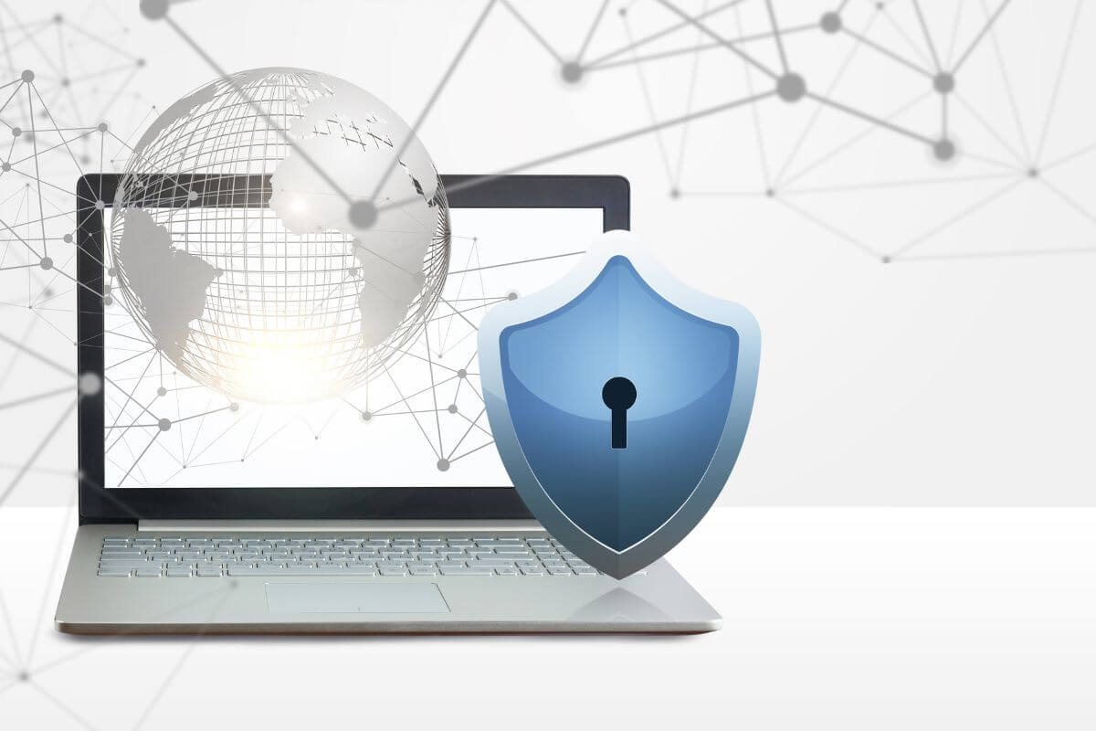 a photo of a laptop with a data protection triangle
