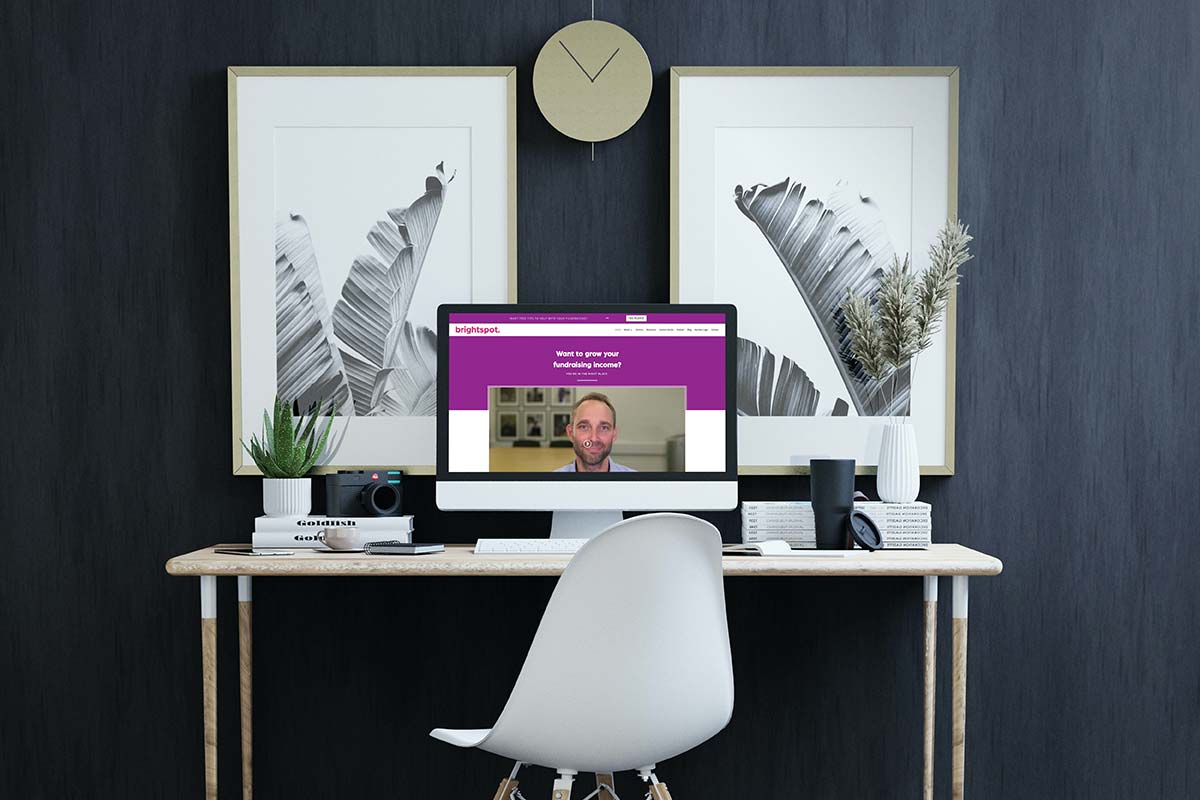 Bright Spot Fundraising A photo of a Desktop with Bright Spot Fundraising website on an iMac