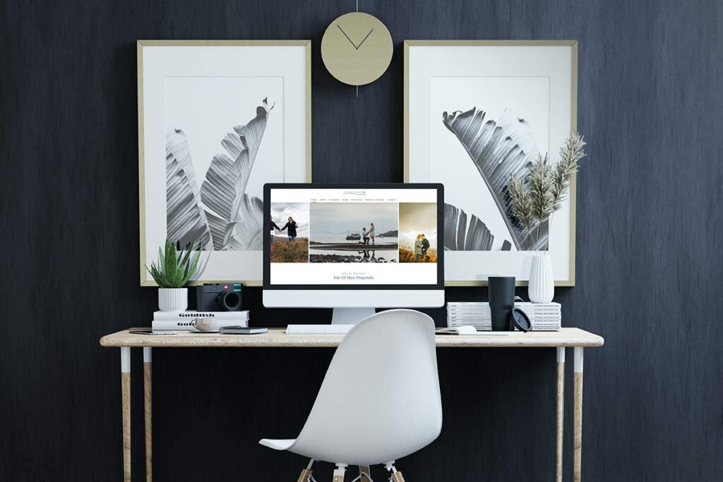 A photo of a iMac on a desk with Skye Proposals website on it